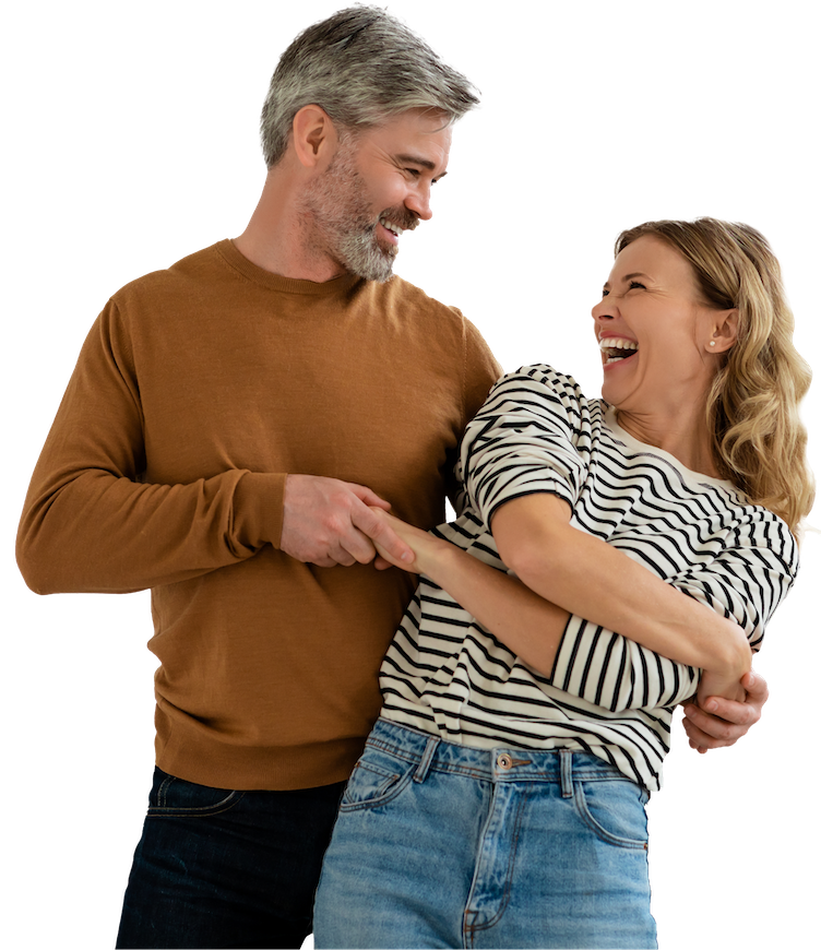 Senior Couple Dancing together with arms up in pose